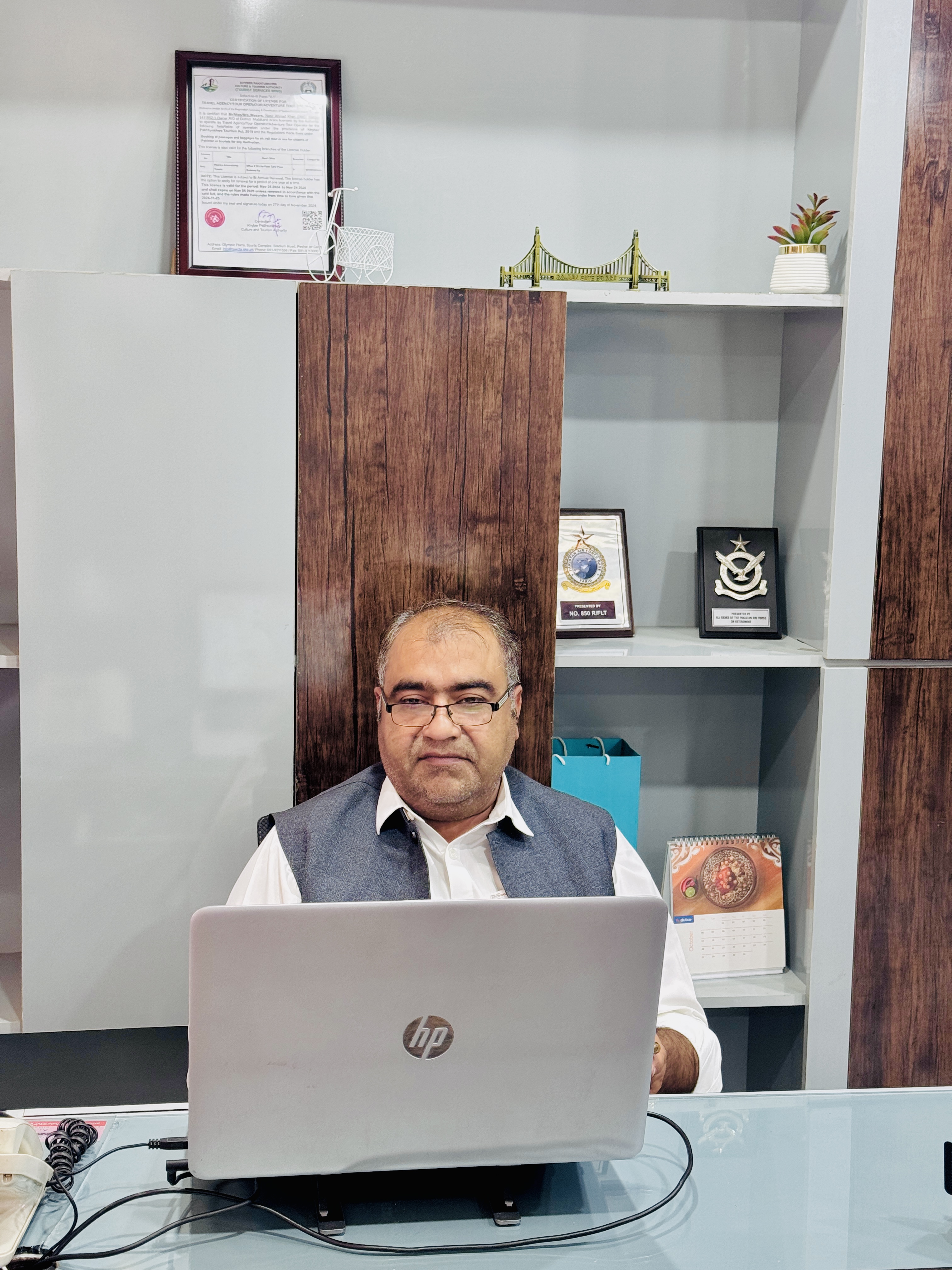 Portrait of Nasir Ahmad Khan, Managing Director